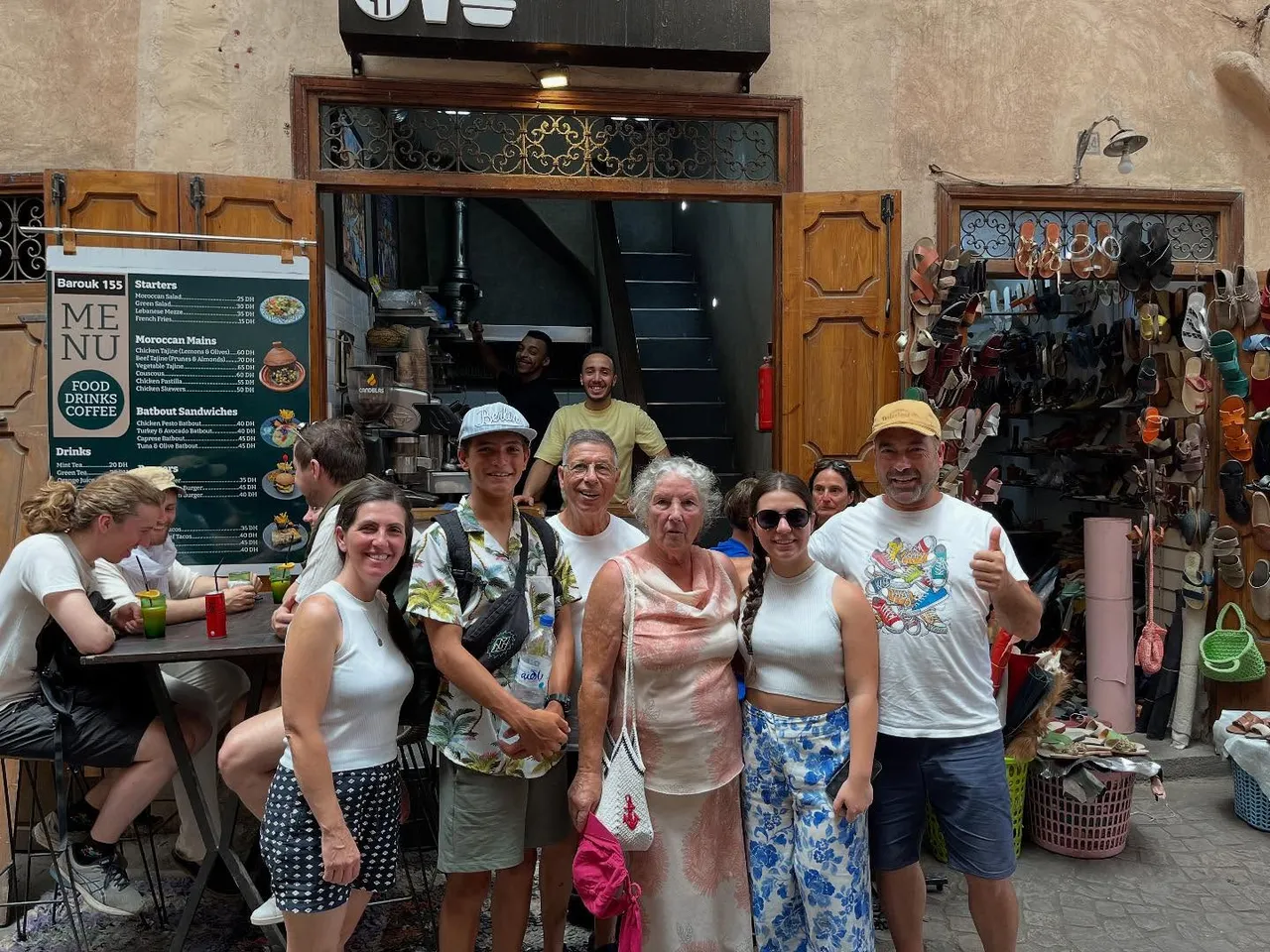 Guests in front of the Barouk 155 sign