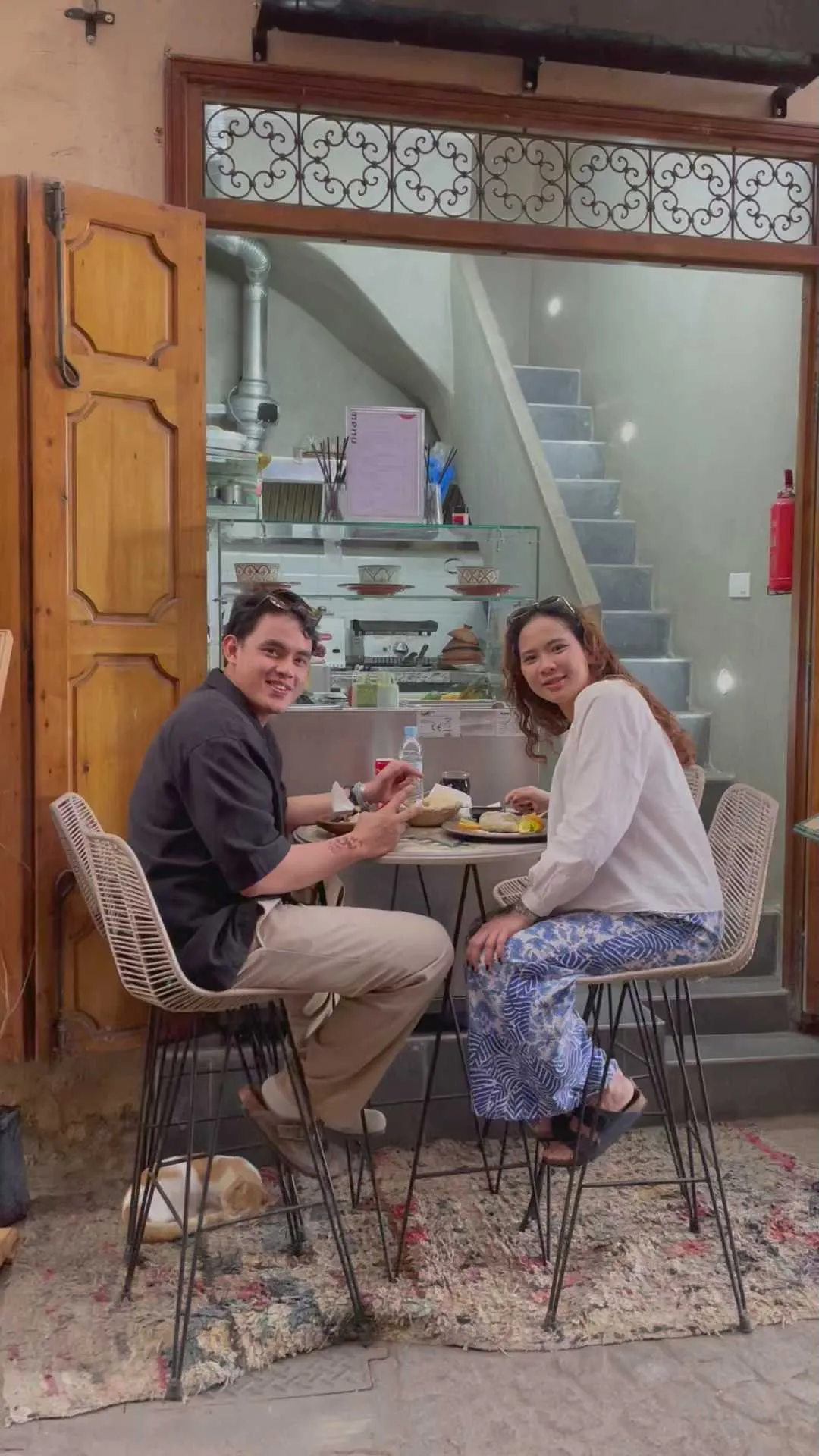A couple dining in the Barouk 155 room